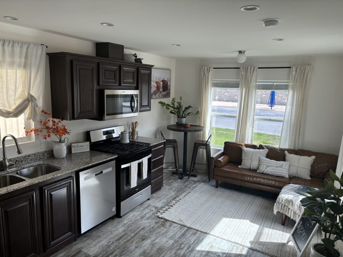 Interior kitchen and living room of new manufactured home in Paso Robles by Cravens Manufactured Homes